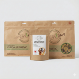 Artisan Raw GO! Sampler Box featuring freeze-dried meal packages in brown bags with pet food details and a dog image.