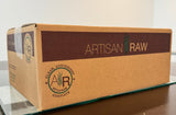Hypoallergenic meal box, 25 lbs, featuring a brown and cream design with the Artisan Raw logo on the side.